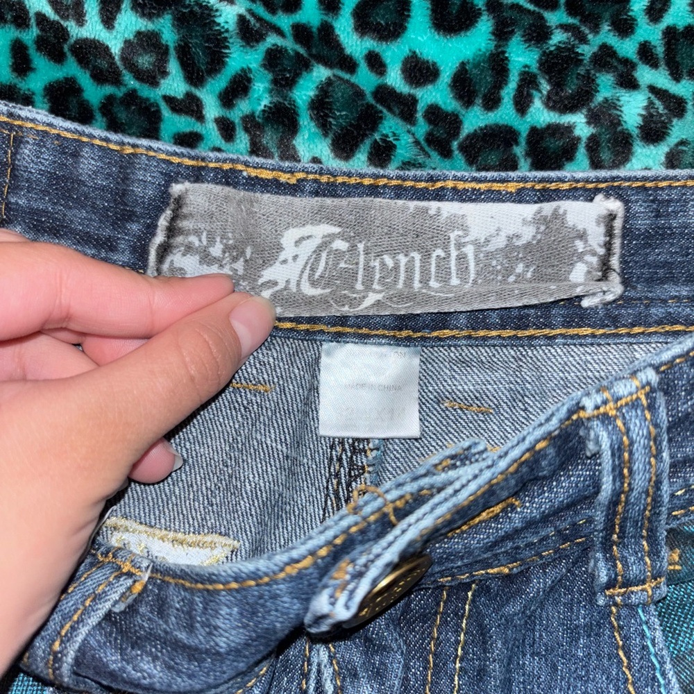 Clench Jorts. Blue, gold.